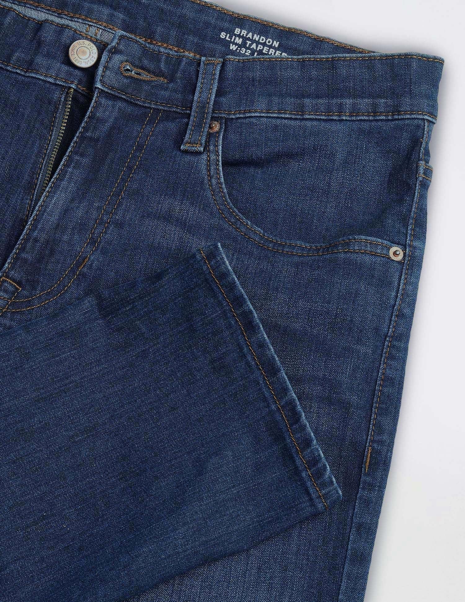 U.S. POLO ASSN. Men's Brandon Slim Tapered Fit Mid Rise Jeans (UDJENO1809_Dark Blue_38) - Image 7
